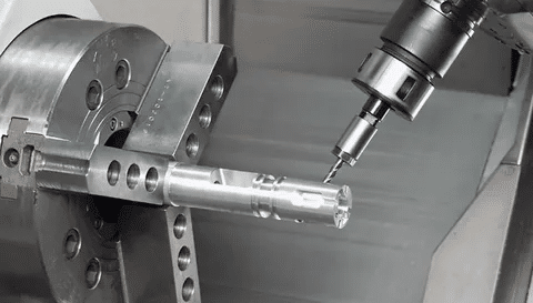 Precision tolerance check on a turned part using contact probe in CNC lathe setup.