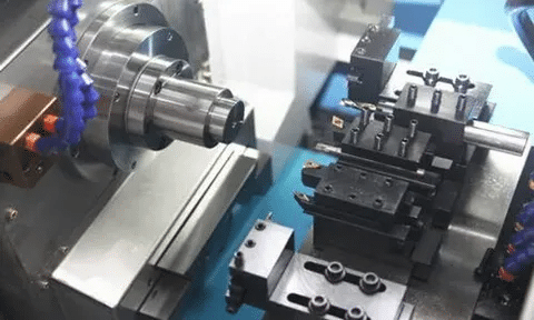 CNC lathe machine with multi-tool configuration impacting production cost