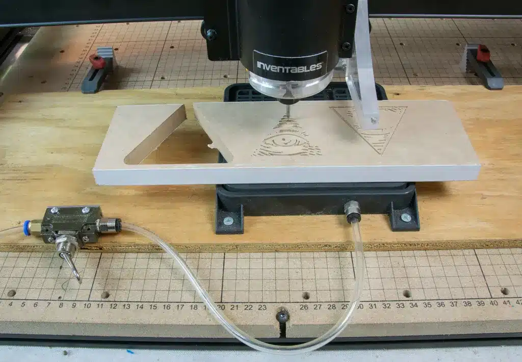 Vacuum pod fixture setup for CNC routing of aluminum sheet