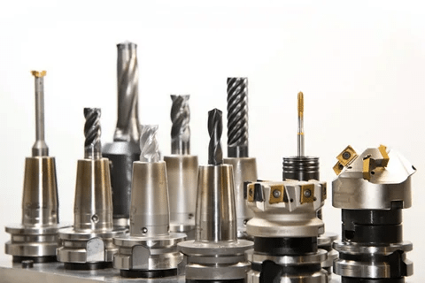 Assortment of CNC tool holders and precision cutting tools for automated machining