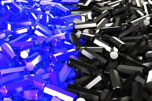 Blue and black plastic rods representing Delrin and nylon materials