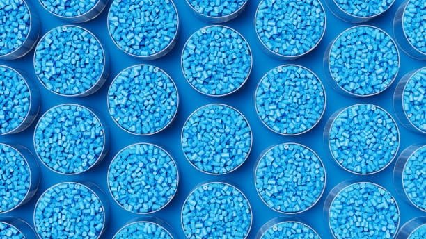 Plastic granules stored in laboratory containers