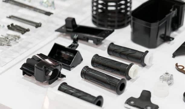 Various plastic parts displayed after CNC machining
