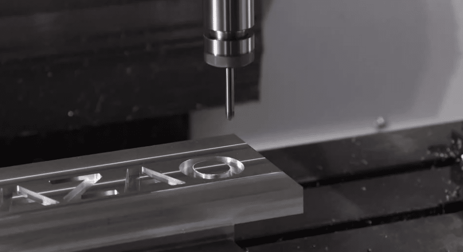 High precision CNC milling on stainless steel block using end mill