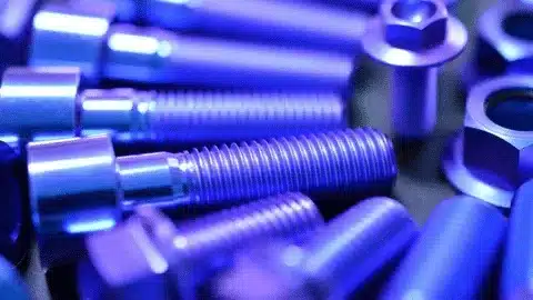 Close-up of hard anodized aluminum fasteners showing durable surface protection.