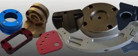 Hard anodized aluminum parts in various shapes for engineering and manufacturing.