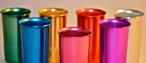 Colorful anodized aluminum cups showing decorative and corrosion resistant finishes