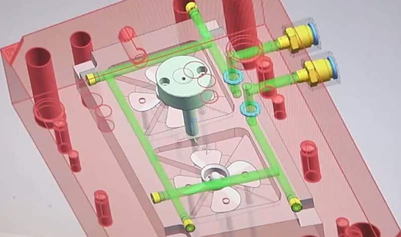 3D visualization of injection mold runner system and cooling channels showing balanced flow and thermal control