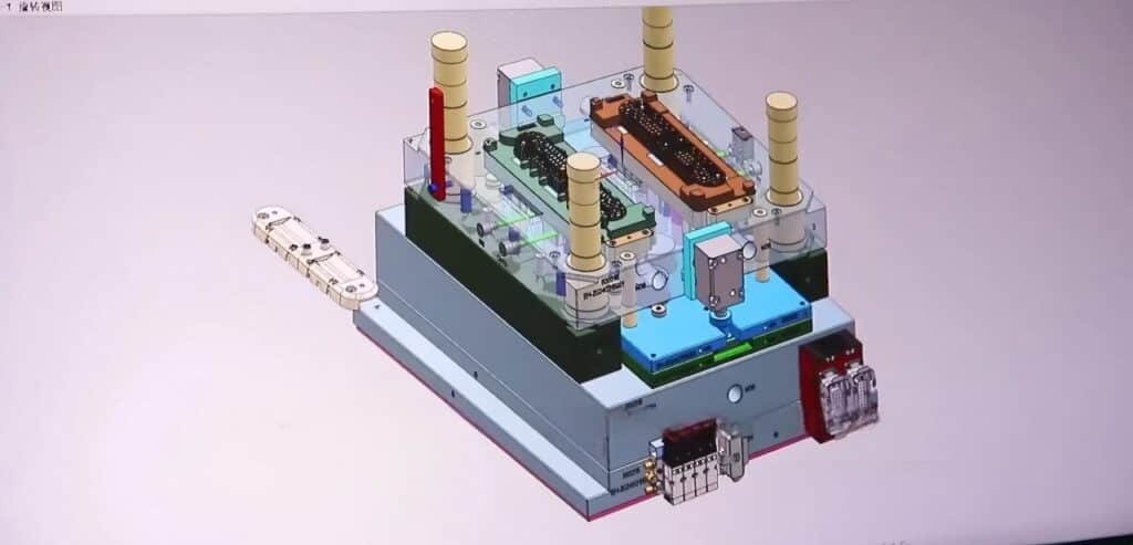 3D transparent injection mold structure showing cavity layout, cooling channels, ejector system, and guide pillars
