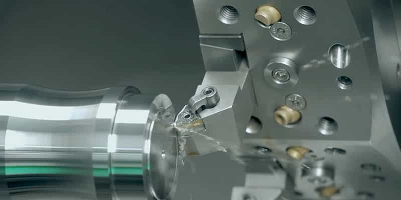 EDM wire cutting forming internal micro-features such as blind holes and narrow slots in a mold component