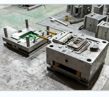 Injection mold base and mold components prepared for assembly at a professional mold making manufacturer