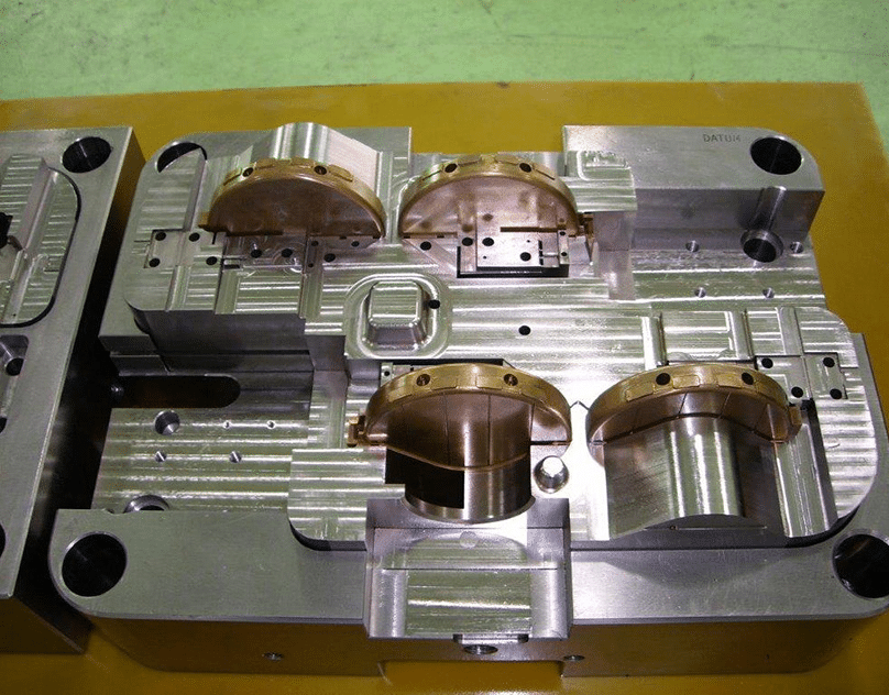 Multi-cavity injection mold with precision machined cavities manufactured by a professional mold making manufacturer