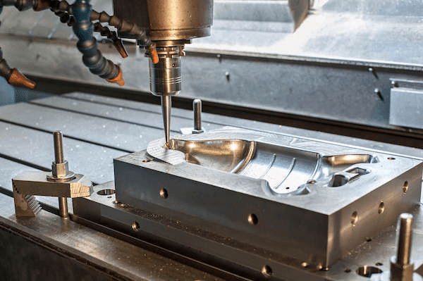 CNC machining of precision mold cavity with fine surface finishing for injection mold making