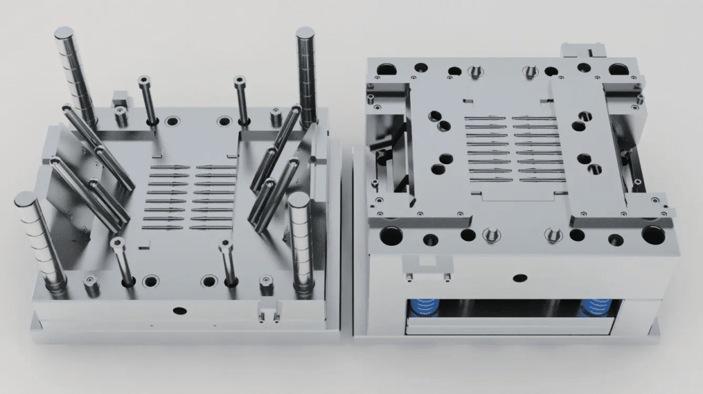 Precision injection mold halves showing guide pins, ejector system, and alignment features for repeatable molding