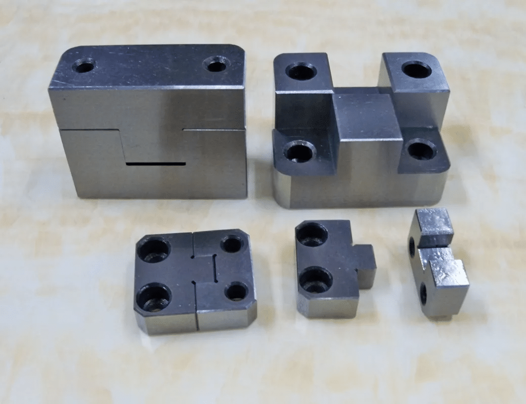 Precision machined mold blocks and inserts with tight tolerances for injection molding