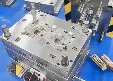 Precision mold components manufactured by CNC machining, showing core and cavity inserts with tight tolerances and controlled surface finish