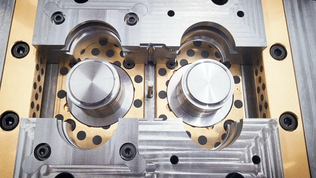 High-precision injection mold core and cavity alignment with venting holes and bearing surfaces that affect mold accuracy and failure risk